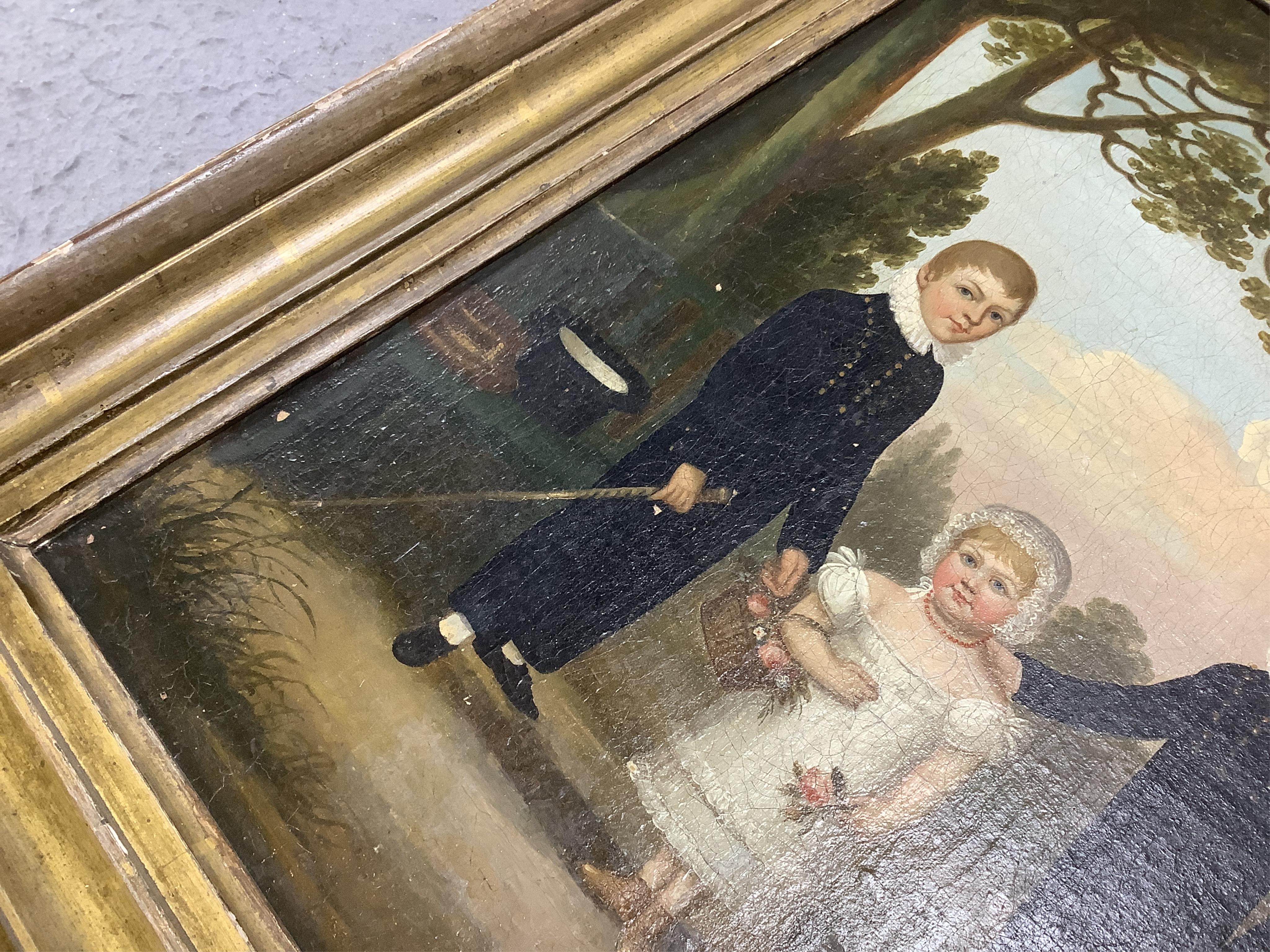 Early 19th century, English School, naive oil on canvas, Three children before a landscape, 38 x 32cm. Condition - fair, craquelure throughout